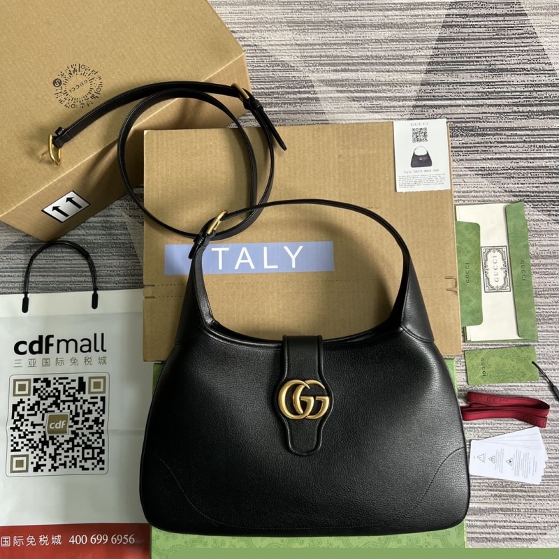 G*u*i top handle bags